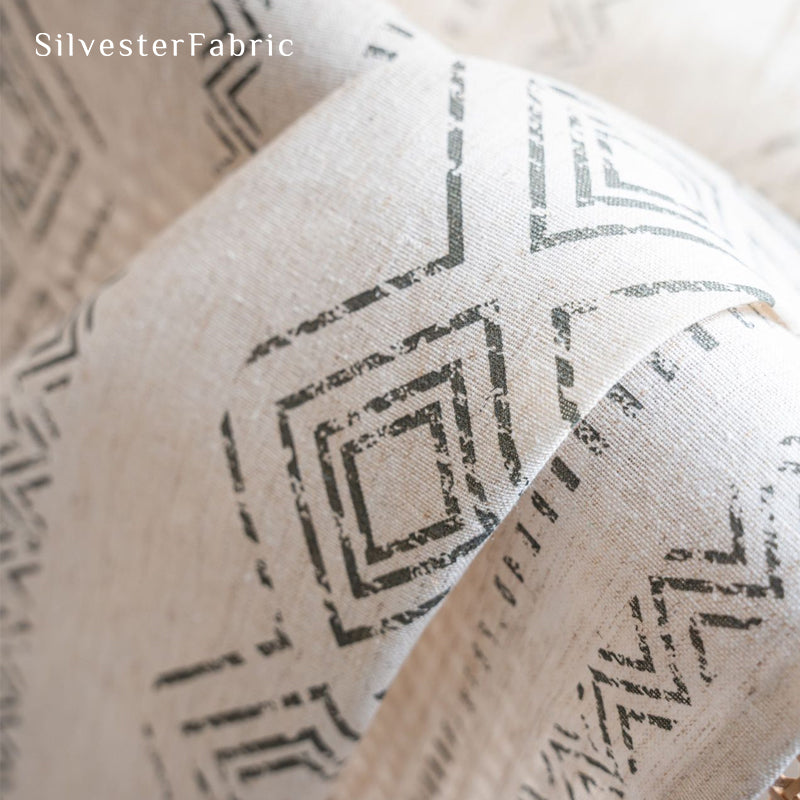 White geometric line linen curtains hanging in the bedroom window
