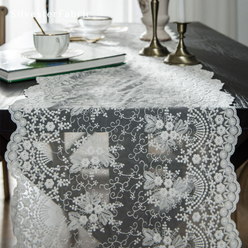 white lace table runner edge stitching detail