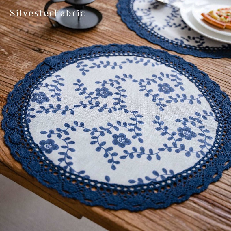 Vintage blue floral table mats on the table