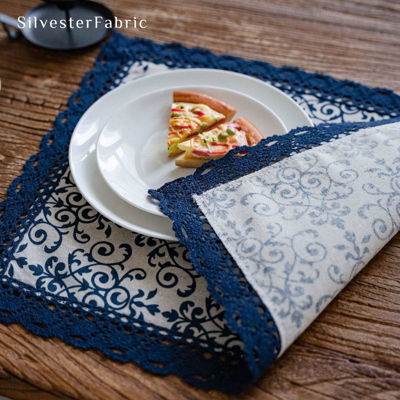 Blue floral linen table mats on the table