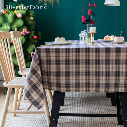 beige Christmas tartan plaid cotton tablecloth laid flat on dining table