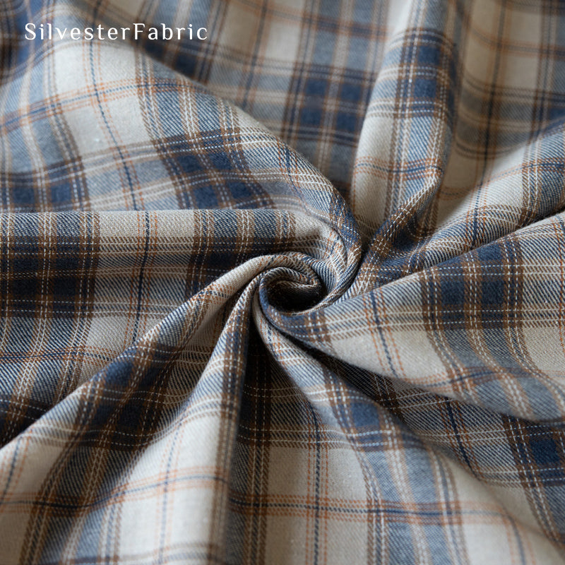 beige Christmas tartan plaid cotton tablecloth fabric close-up