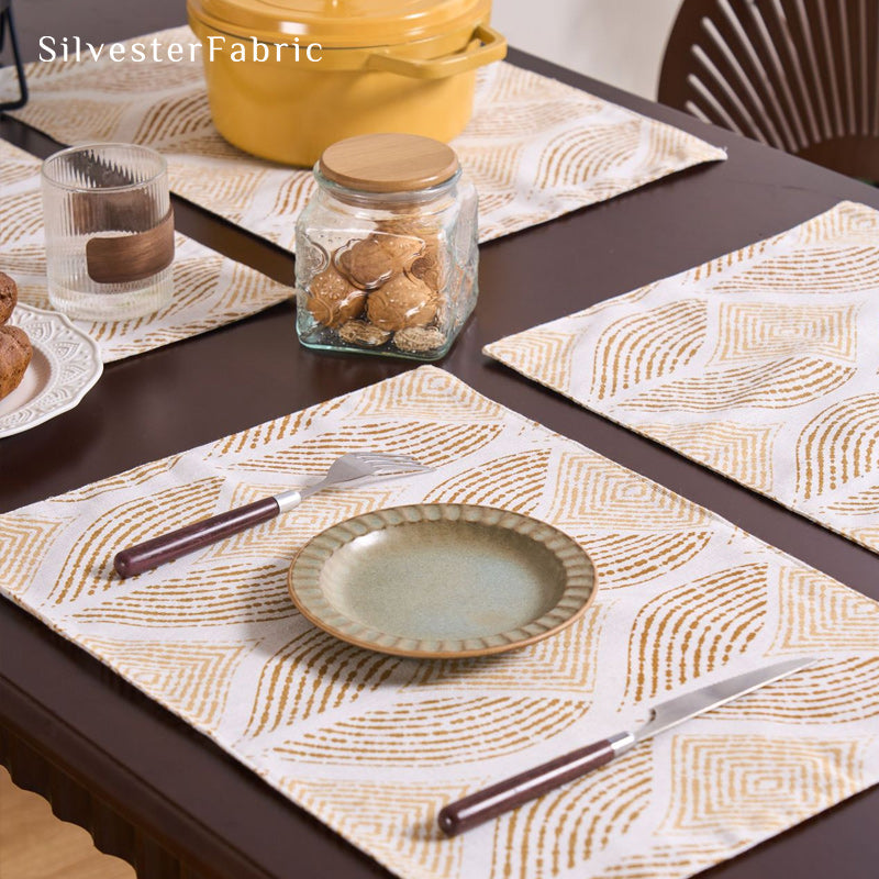 beige textured farmhouse placemats laid flat on dining table