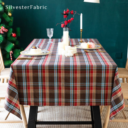 brown Christmas tartan plaid cotton tablecloth laid flat on dining table
