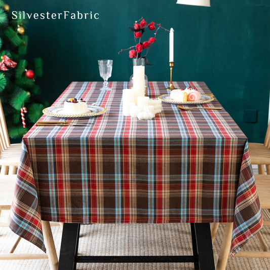 brown Christmas tartan plaid cotton tablecloth laid flat on dining table