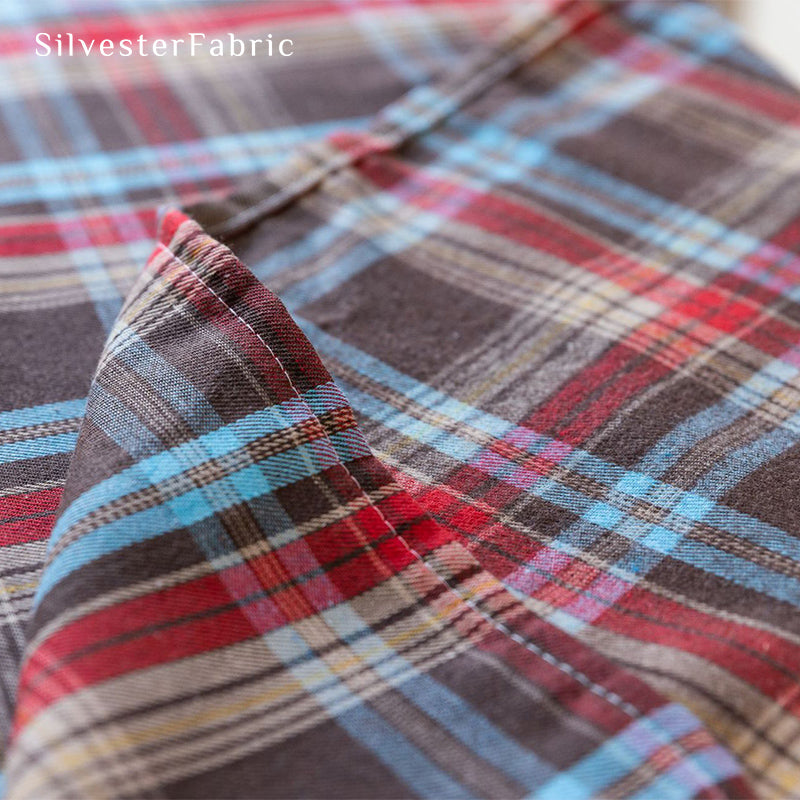 brown Christmas tartan plaid cotton tablecloth fabric close-up