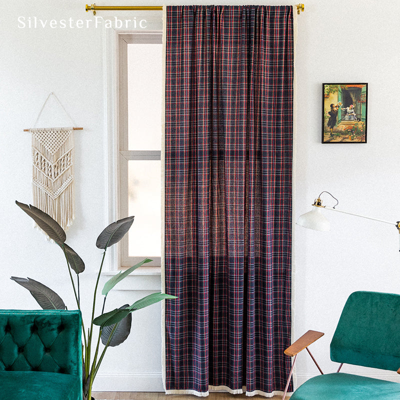 Christmas plaid blue curtains hanging in the living room window