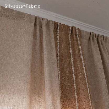 Embroidered Striped Brown Curtains Hanging Over Bedroom Window