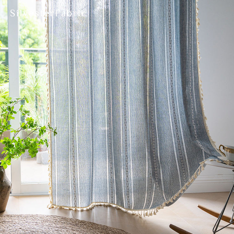 Close-up of a Corner of the Light Blue Striped Curtain