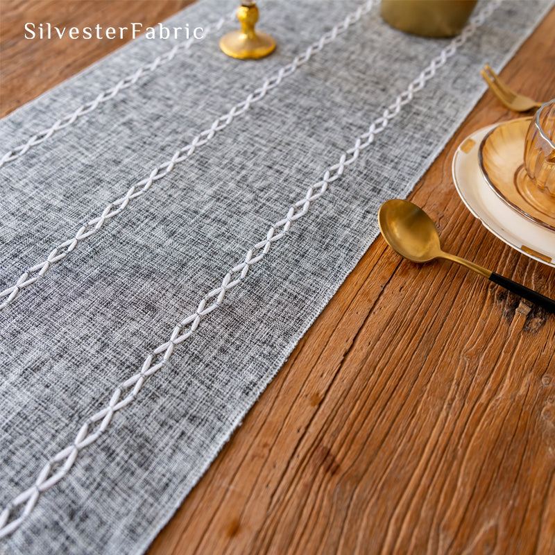 dark grey table runner fabric close-up