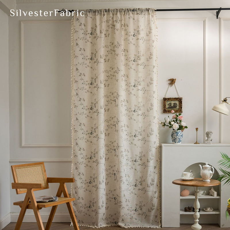 floral farmhouse sheer curtain hanging in window