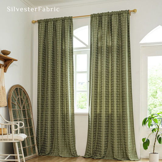 green jacquard farmhouse curtain hanging in window