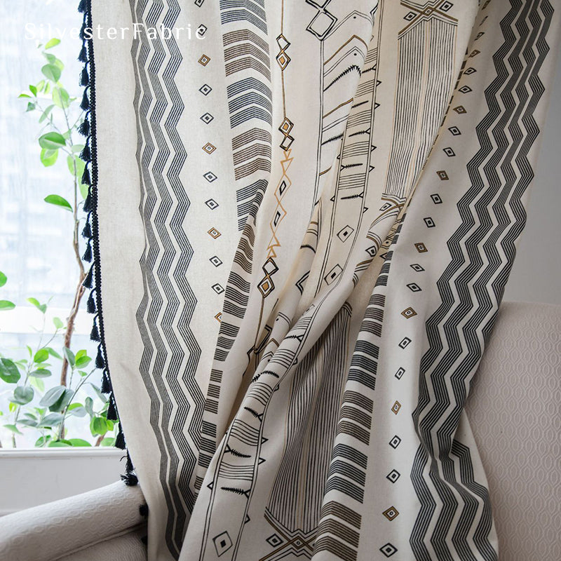 Bohemian geometric linen curtains hanging in bedroom window