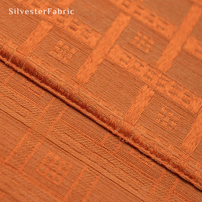 Orange jacquard farmhouse curtain fabric close-up