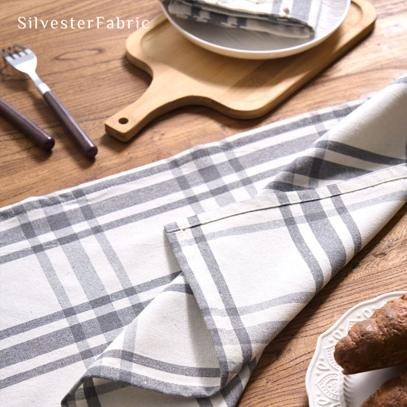 white farmhouse plaid placemats laid flat on dining table