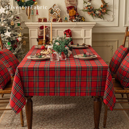 Red Christmas tartan plaid cotton tablecloth draped over rectangle table