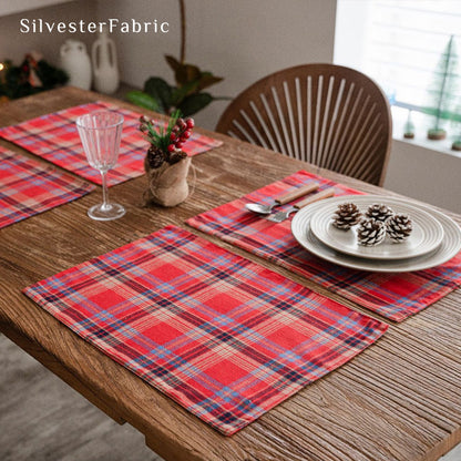 red Christmas plaid placemats set of 4 arranged on rectangle table