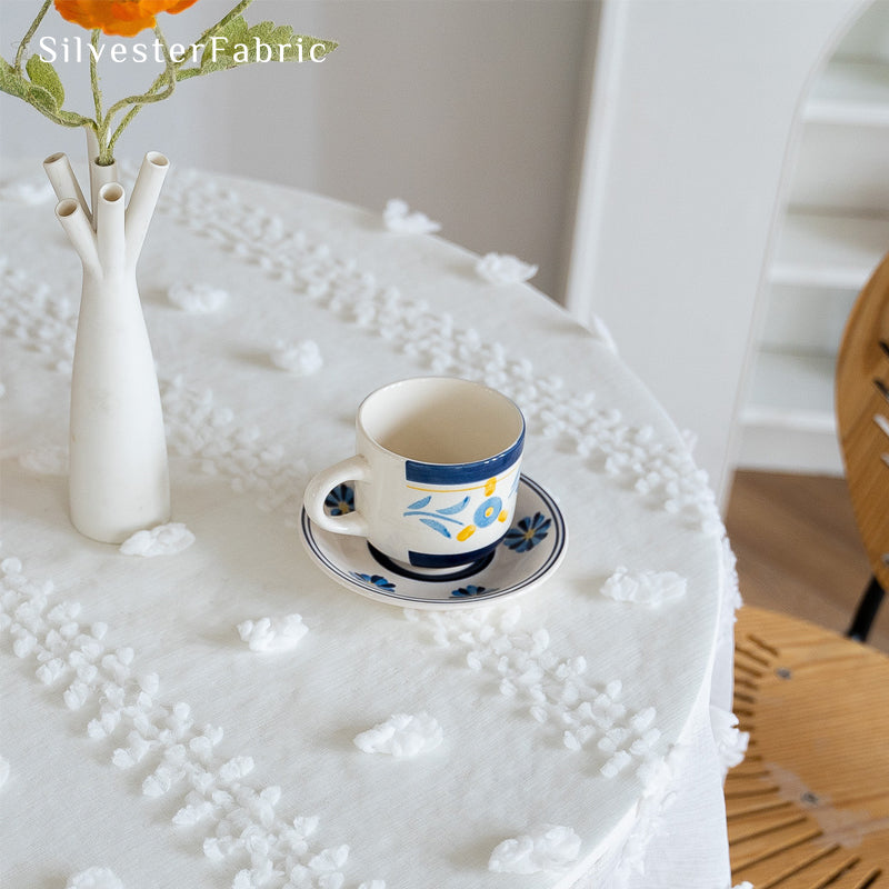 white French tufted tablecloth fabric close-up