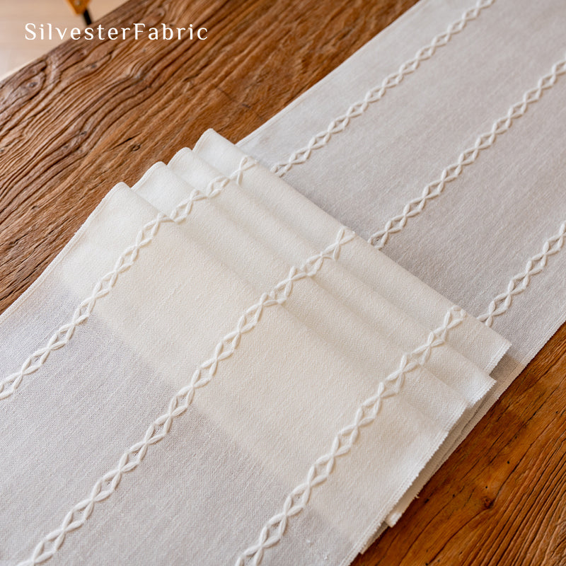white table runner fabric close-up
