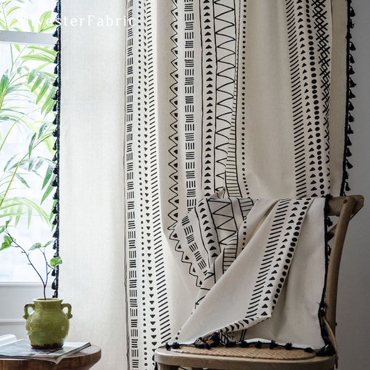 White geometric line linen curtains hanging in the bedroom window