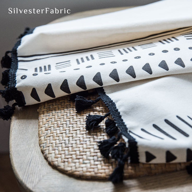 White geometric line linen curtains hanging in the bedroom window