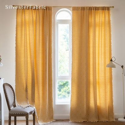 Close‑up of yellow farmhouse diamond curtain corner
