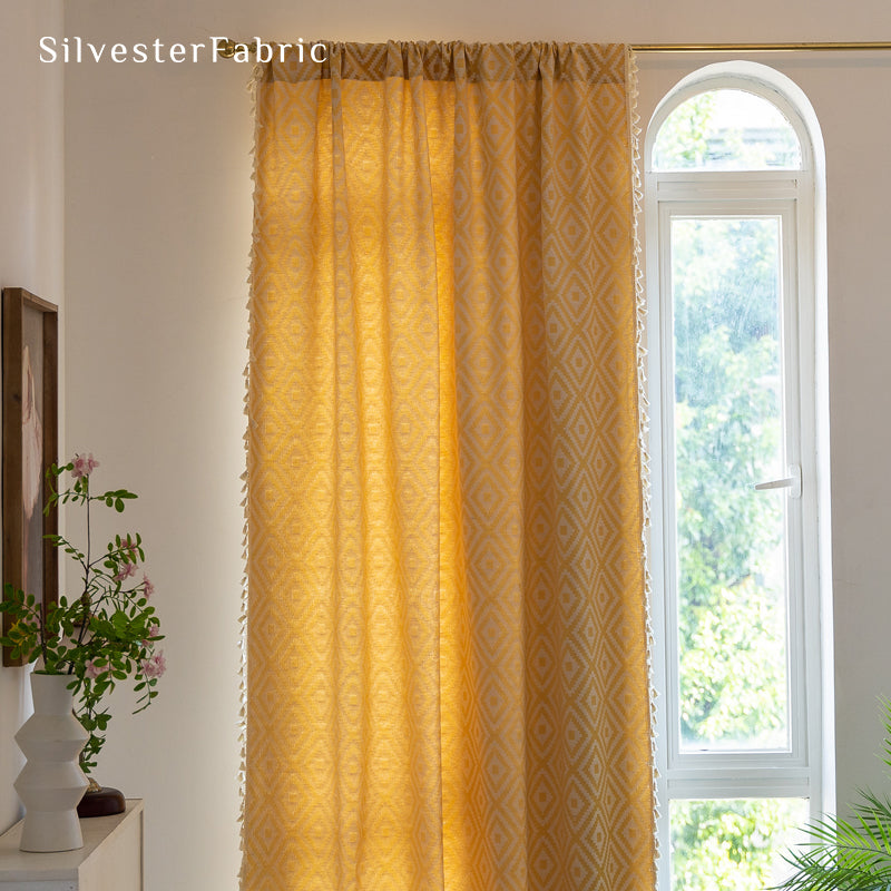 Close‑up of yellow farmhouse diamond curtain