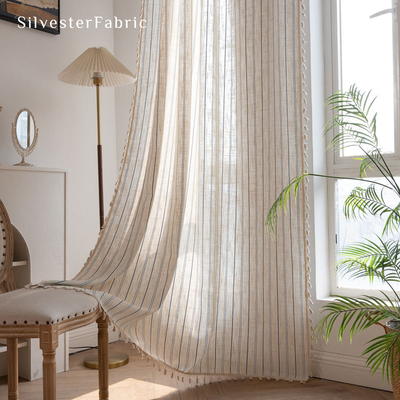 Close‑up of Beige vertical striped curtain corner