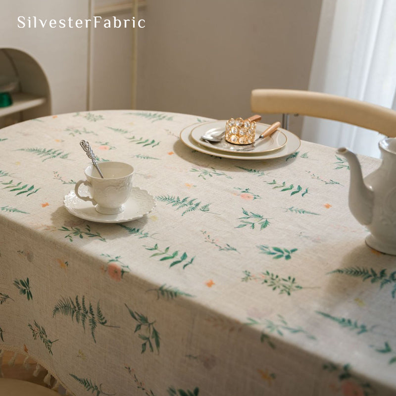 floral farmhouse tablecloth laid flat on dining table