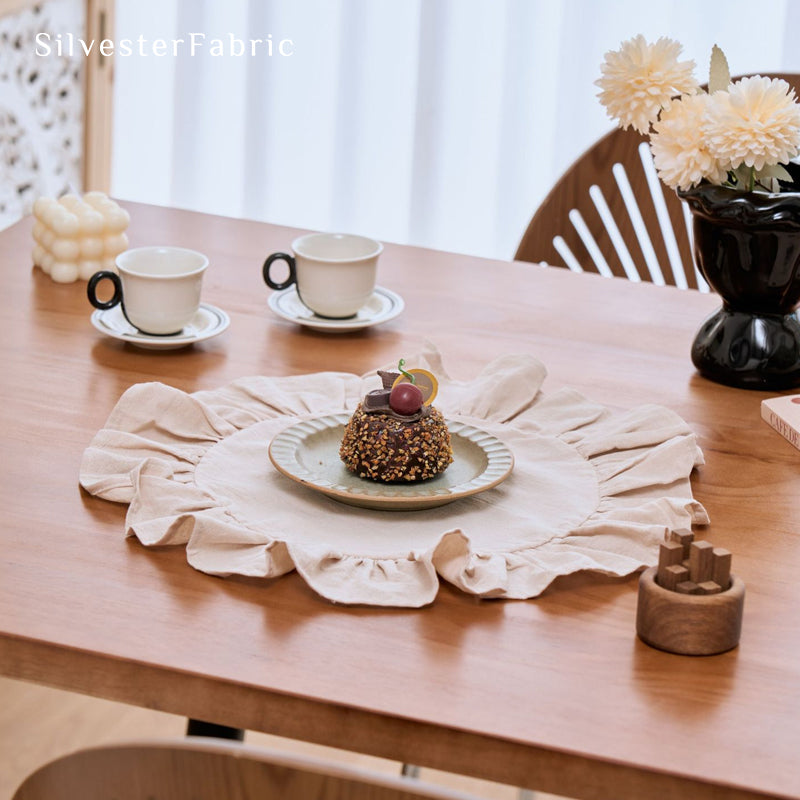 beige farmhouse round placemats laid flat on dining table