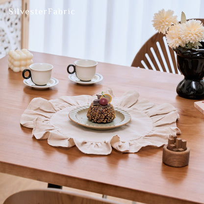 beige farmhouse round placemats laid flat on dining table