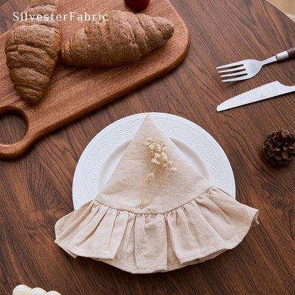 beige farmhouse round placemats layered over tablecloth