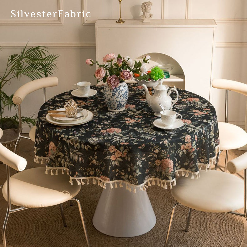 black round  farmhouse  floral tablecloth laid flat on dining table
