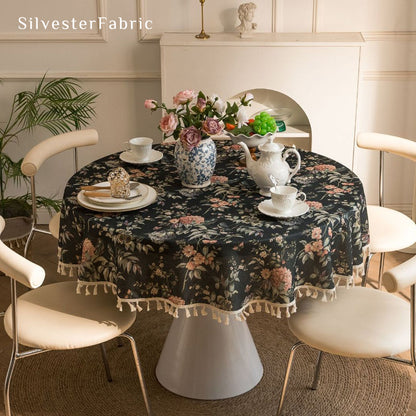 black round  farmhouse  floral tablecloth laid flat on dining table