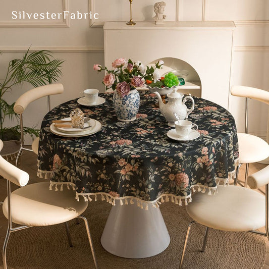 black round  farmhouse  floral tablecloth laid flat on dining table