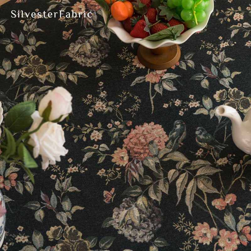 black round  farmhouse  floral tablecloth fabric close-up
