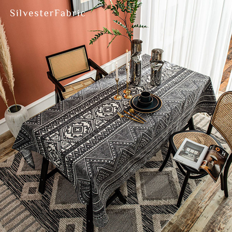 Bohemian printed black tablecloth covers the table