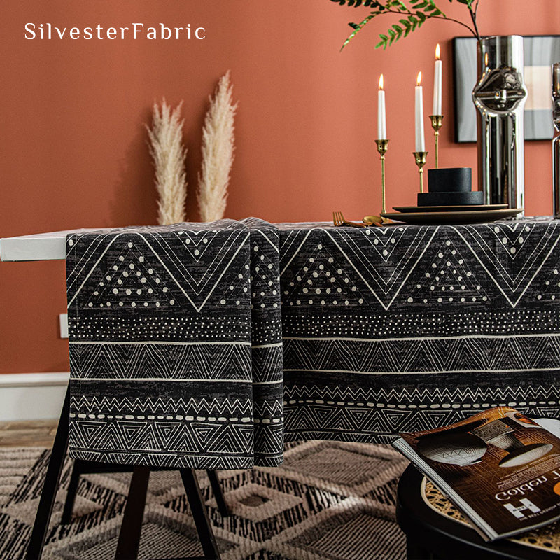 Bohemian printed black tablecloth covers the table