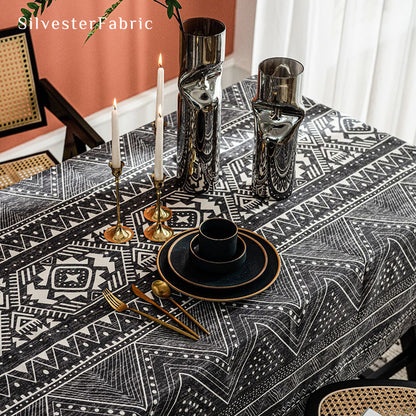 Bohemian printed black tablecloth covers the table