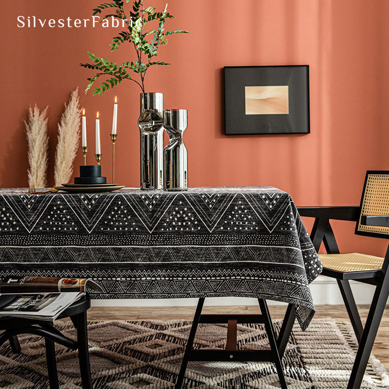 Bohemian printed black tablecloth covers the table