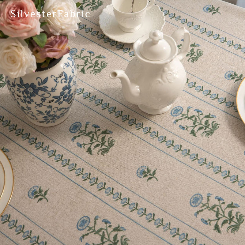 blue floral round farmhouse tablecloth texture and weave detail