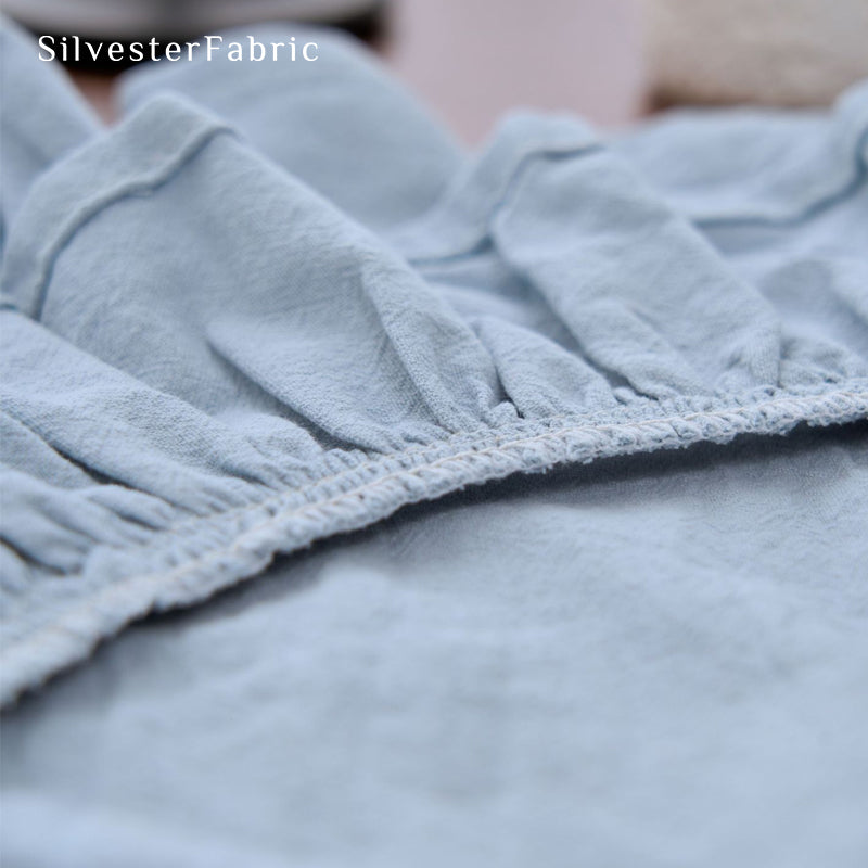 blue farmhouse round placemats edge stitching detail