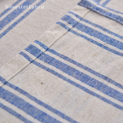 blue striped farmhouse tablecloth edge stitching detail