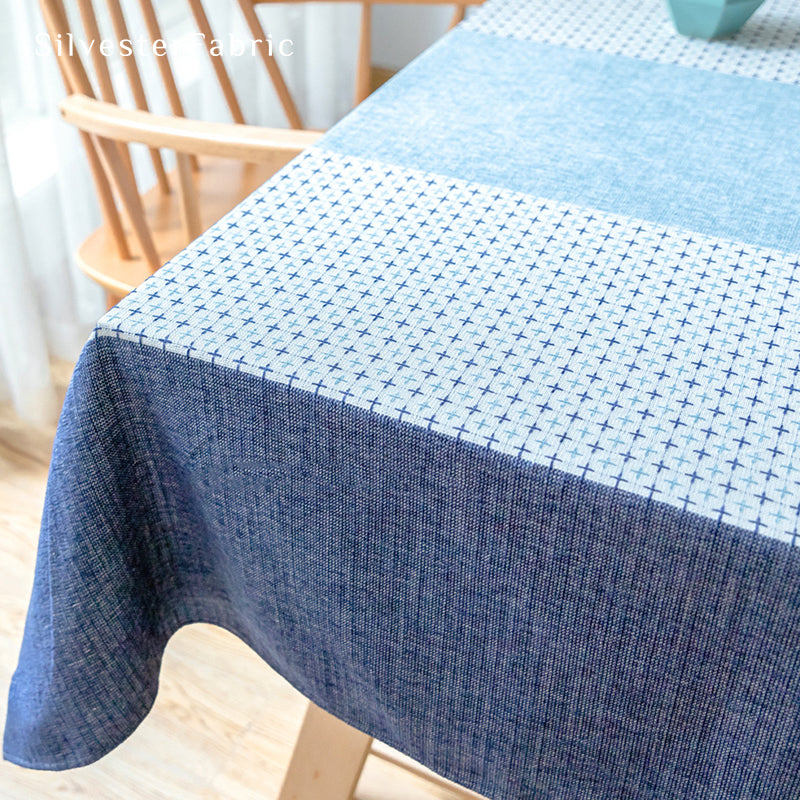 Blue geometric color block tablecloth over table