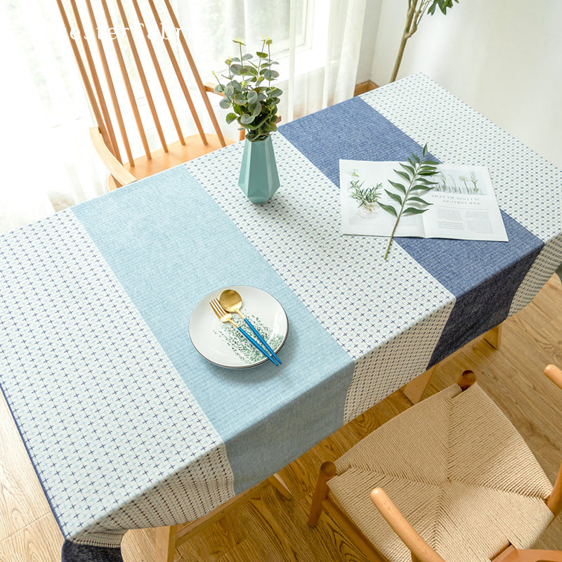 Blue geometric color block tablecloth over table