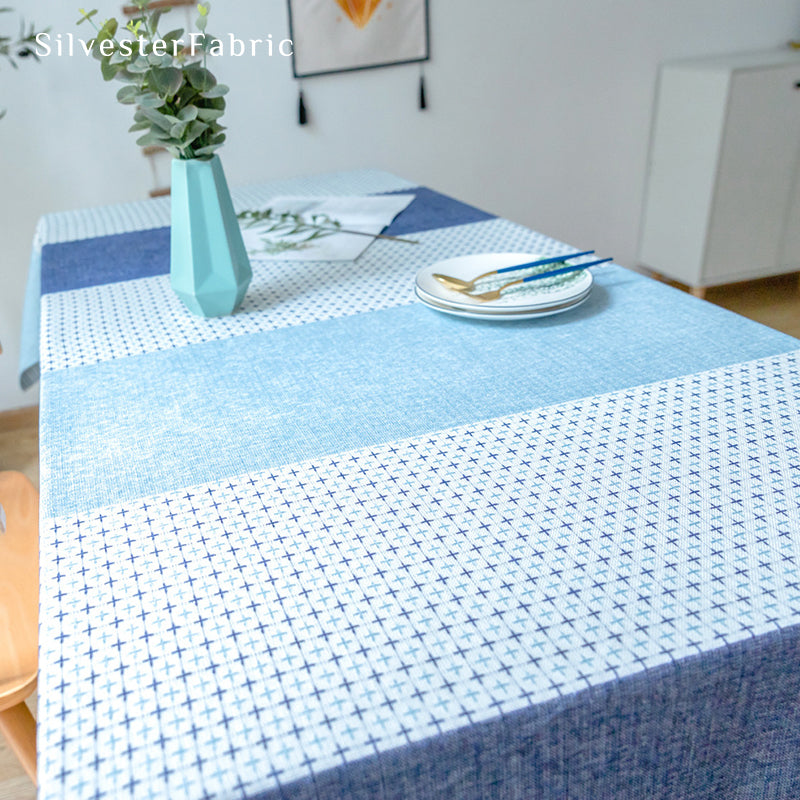 Blue geometric color block tablecloth over table