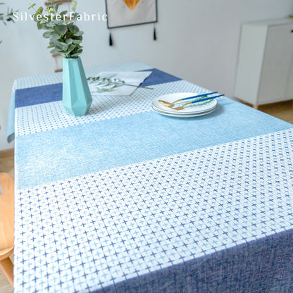 Blue geometric color block tablecloth over table