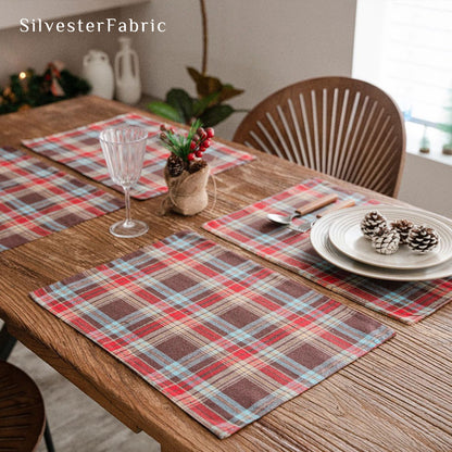 brown Christmas plaid placemats set of 4 arranged on rectangle table