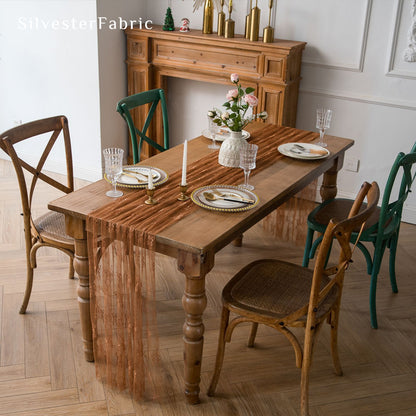 brown lace table runner draped over rectangle table