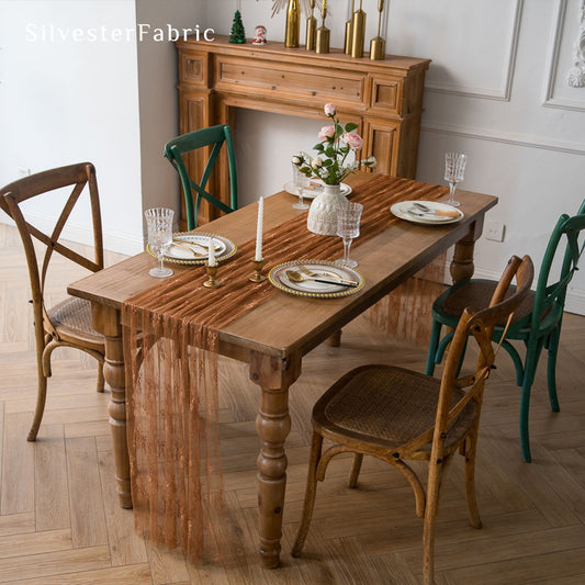 brown lace table runner draped over rectangle table